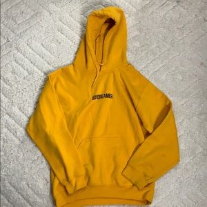 Graphic yellow drawstring hoodie